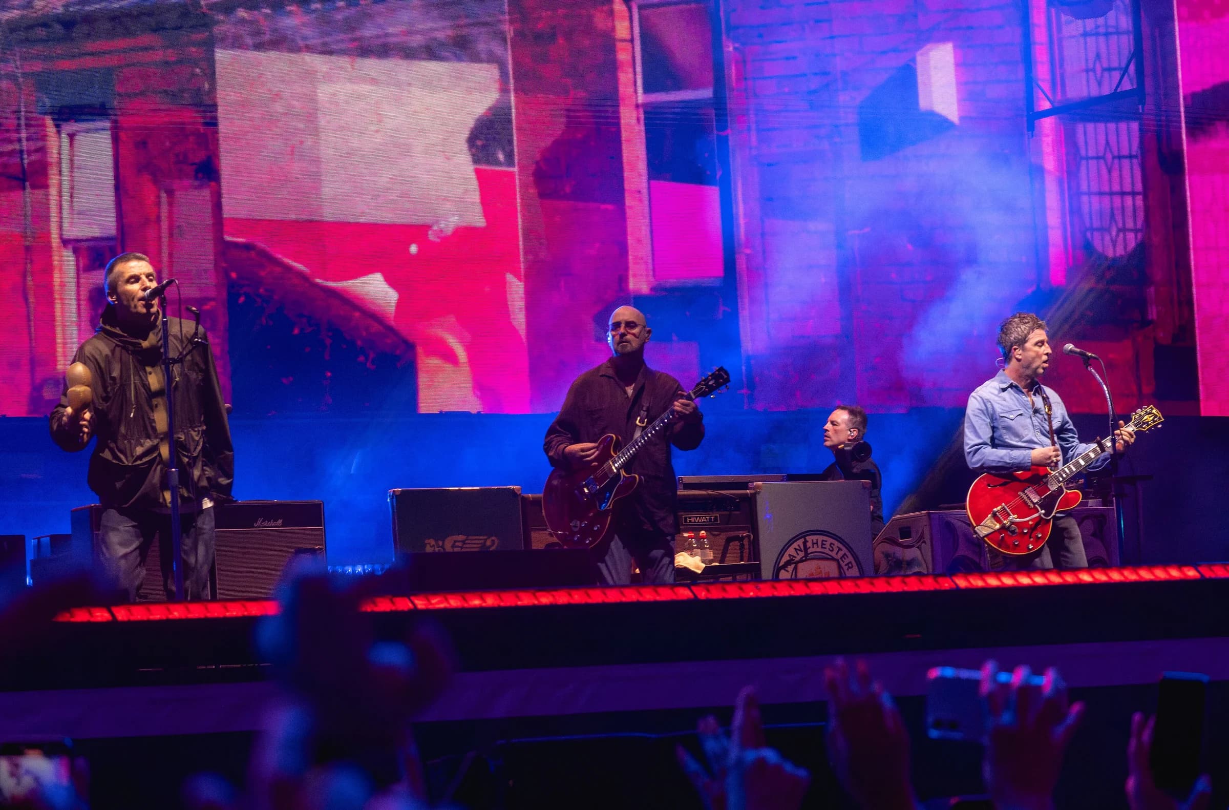 Oasis performing live in Cardiff
